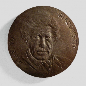 Medal „Alberto Giacometti”. Medal z portretem rzeźbiarza odlany w brązie.